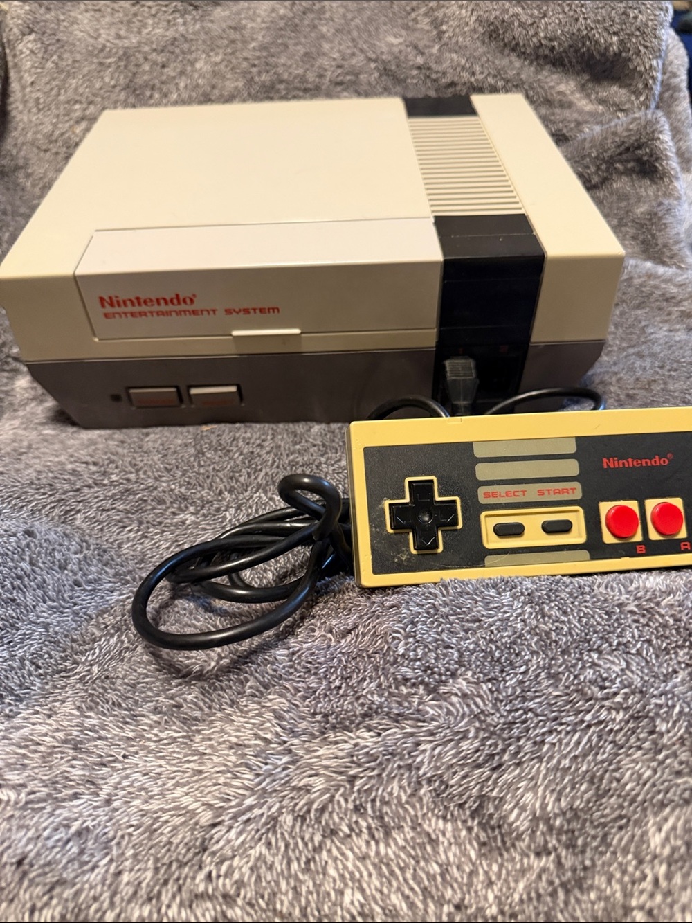 Nintendo Entertainment System Console with Gray, Black and Red Controller